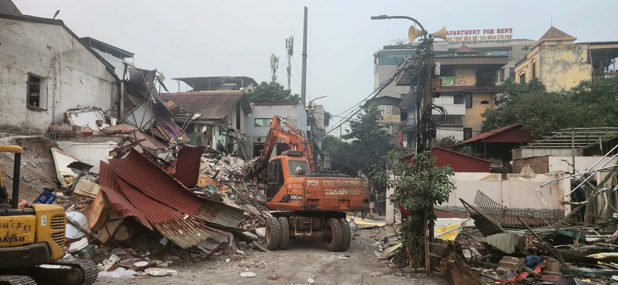 Figure 1. Bulldozers clearing houses on Nghi Tam Street, Hanoi, 9 April 2026. Photograph by Philip Seaton, used with permission.
