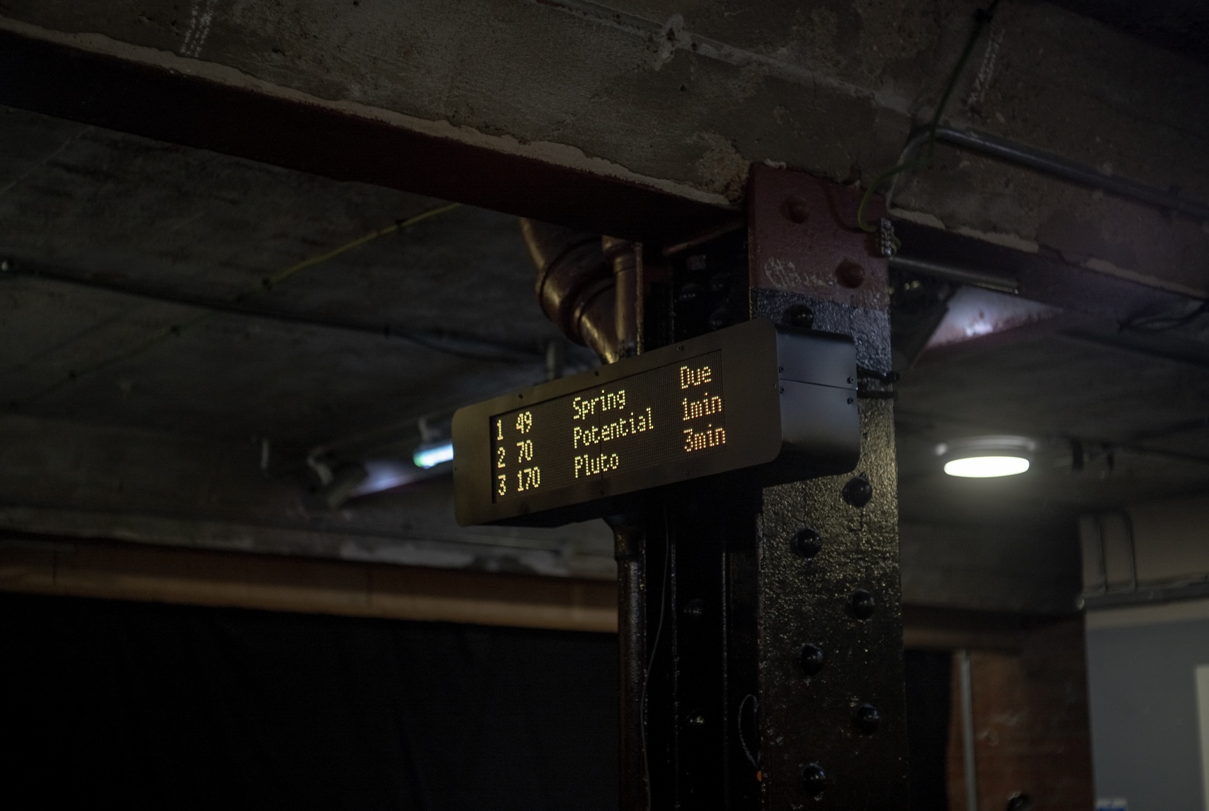 Figure 2 – The Promise of Happiness, 2025. Moving image sculpture. Timber, steel, aluminium, spray paint, single-board computer, and RGB matrices. Installation view, BOLD Theatre, Elephant and Castle, London. Shown as part of “Plant a Lamppost in the Exhibition”, Street Study Group, 26th–29th August 2025. Image: © 2026 Max Livesey.